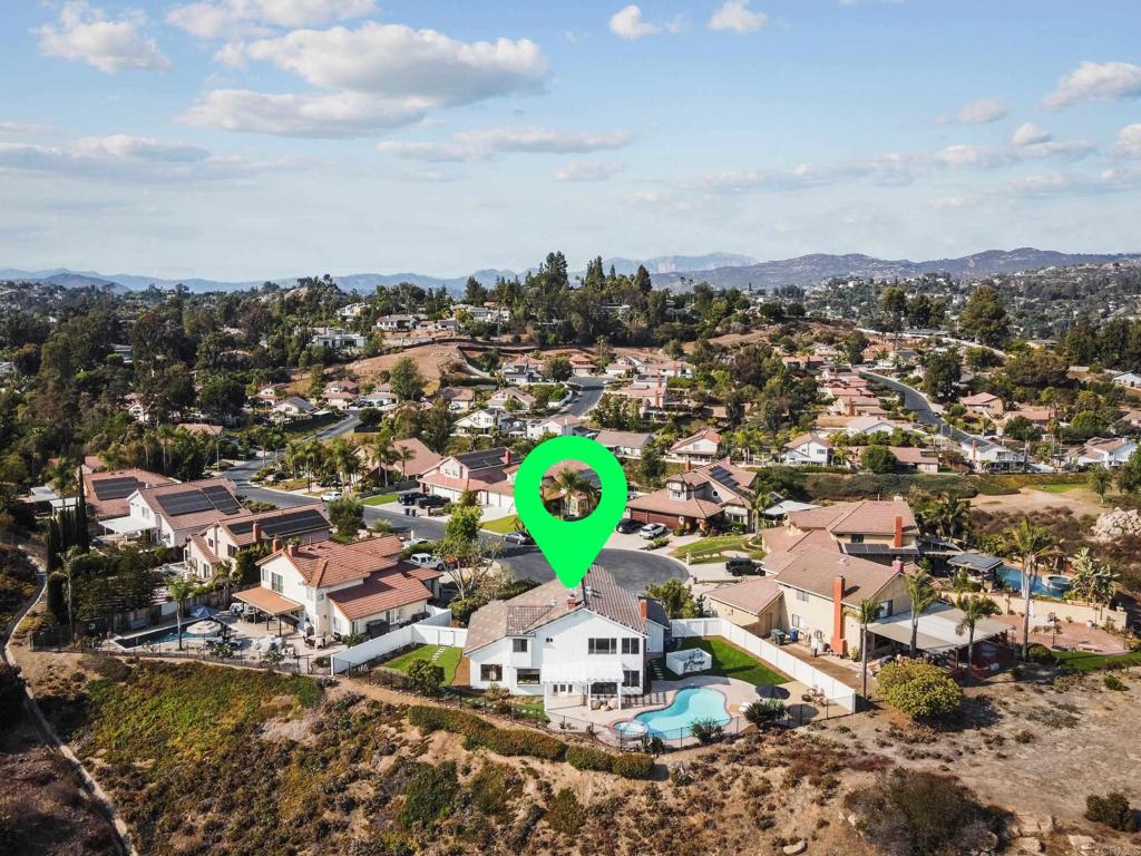 Enjoy panoramic mountain views at this beautifully remodeled 4 bed, 3 bath home at the end of a cul-de-sac in the highly sought-after gated community of Fuerte Knolls. Featuring a functional layout with one bedroom and full bath on the main floor, and fresh upgrades throughout—replastered pool, new vinyl plank flooring & carpet, quartz countertops, paint, a new vinyl fence and more! The kitchen features stainless steel appliances, custom tile backsplash, and a large breakfast bar, perfect for gatherings. The spacious primary suite includes a fireplace, spa-like bath, and peaceful views. Two additional upstairs bedrooms are generously sized. The low-maintenance backyard offers a large, covered patio, pool, and spa—ideal for entertaining or relaxing. A 3-car garage provides ample parking and storage. Pride of ownership shines throughout this private, well-kept neighborhood with close proximity to top schools, shopping, dining, and freeway access. Move-in ready and beautifully styled—this one checks all the boxes.