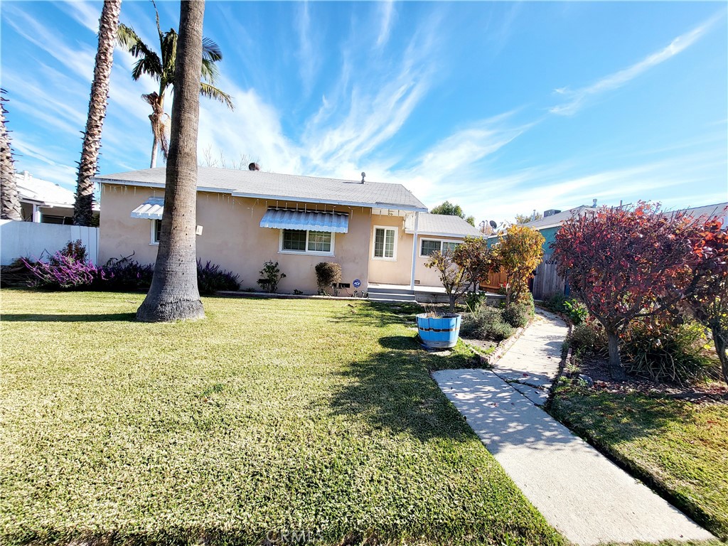 Welcome to 6030 Lindley Ave, nestled in the highly coveted Encino Park neighborhood. This exceptional home radiates charm and sophistication, offering unparalleled privacy both indoors and out. This stunning home offers 3 spacious bedrooms and 2 bathrooms, 4th bedroom was a play room, encompassing nearly 1,622 square feet of living space, lot size 6,119. Step into the living room, has bonus room to for office/playroom, family room featuring a cozy fireplace, built-ins, laminate floors. The spacious kitchen cabinet space with appliances. The inviting primary suite laminate floors, it’s a space you may never want to leave. The primary end-suite bathroom has been remodeled. The peaceful backyard provides an ideal setting for both relaxation and entertainment. A sunken patio creates a perfect space for outdoor lounging and dining, complemented by a spacious grassy area ideal for outdoor games and leisure activities. The owners of this home have meticulously cared for this space over the years. The 2 garage has a restroom or ready to be converted to ADU.