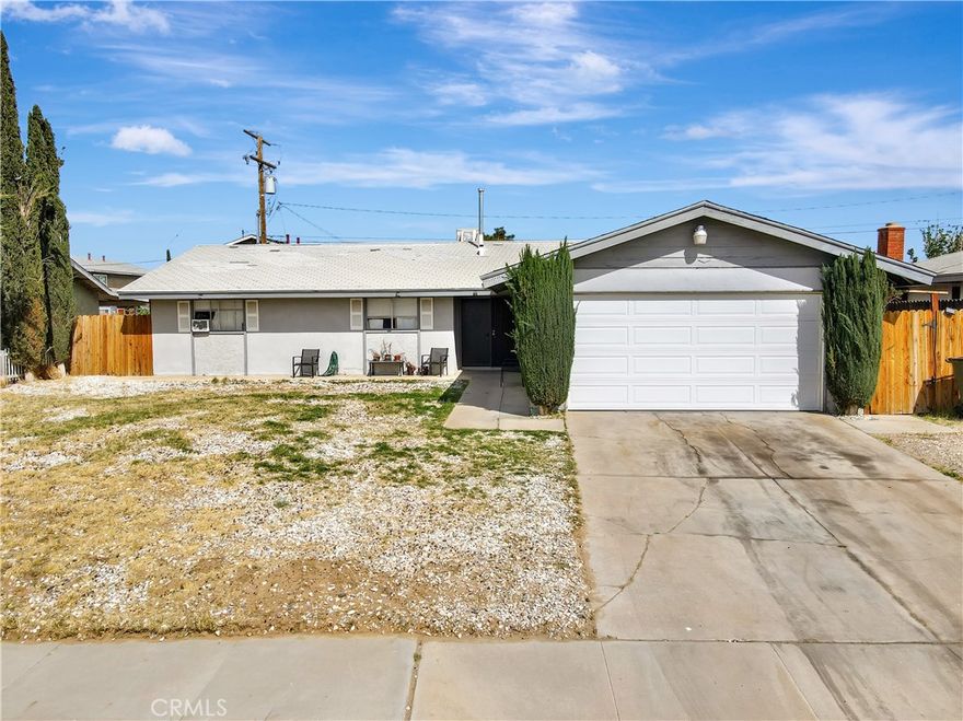 Welcome to 18165 Lilac Road in Adelanto, CA—a beautifully remodeled single-story home offering 4 spacious bedrooms and 2 full bathrooms across 1,456 sq ft of living space. Situated on a generous 9,360 sq ft lot, this property features an expansive backyard with a private swimming pool, perfect for outdoor entertaining. The home boasts central heating, a cozy fireplace in the living room, and a modern kitchen equipped with a 6-burner stove, dishwasher, and disposal. Additional amenities include an attached 2-car garage with laundry hookups. Conveniently located near Highway 395, this home is close to schools and local amenities. 3D TOUR AVAILABLE!