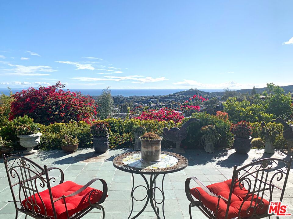 Top of Tigertail- corner lot on the most beautiful, quiet street in coveted Brentwood! Bright and open floor plan. Views from every room. A rare gem. Two large bedrooms with unobstructed views and large adjoining bathrooms. Breathtaking patio is overflowing with fruit trees and herb plants and boasts panoramic city and ocean views. Very large garage, can fit 2 cars with built in storage. Driveway parking and plenty of street parking available. Alarm system, nest cooling-heating, and more. Contact for more details!