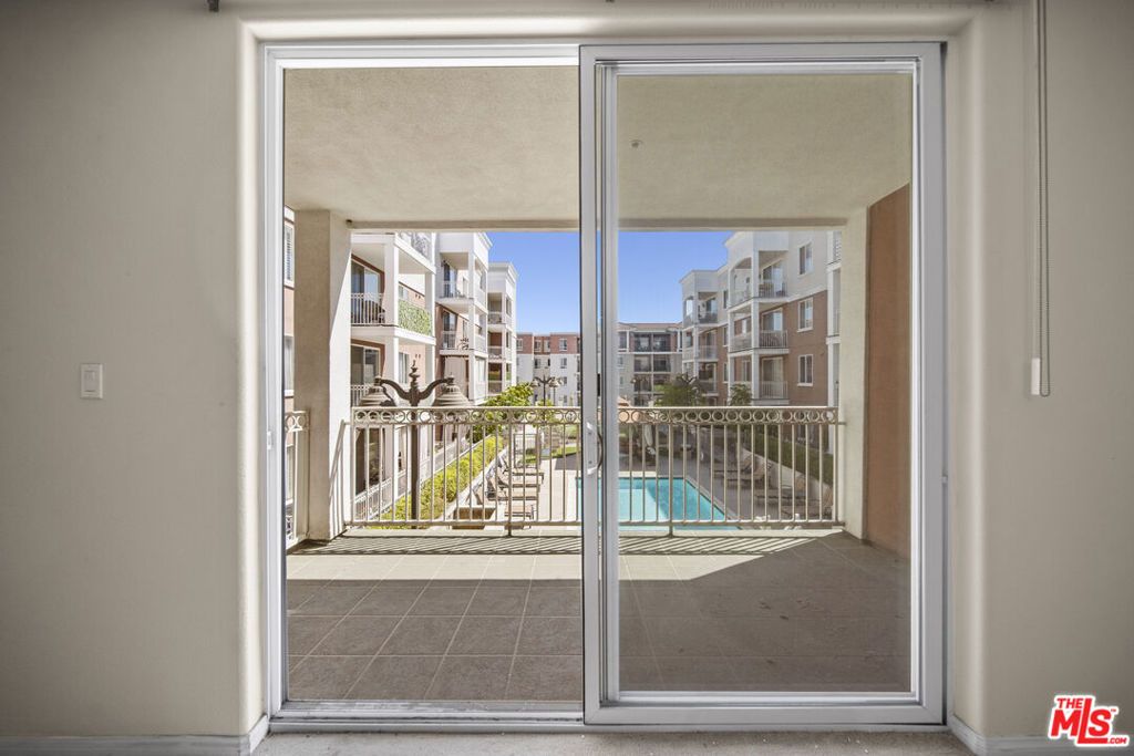 Photo of 3740 Santa Rosalia Drive #212, Los Angeles, CA 90008 (MLS # 24390273)