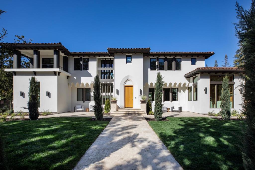 Stunning high end new construction on an oversized lot in highly sought after Crescent Park. A modern interpretation of the Spanish architecture, this just-completed home seamlessly blends into the neighborhood on an oversized beautifully landscaped corner lot. Spanning three levels and over 7,400 square feet, the home is defined by exceptional scale, quality, and a commitment to state-of-the-art, all-electric, solar-powered living. The homes 7 bedroom, 7 bathroom, and 2 powder room layout includes all en suite bedrooms (4 bedrooms upstairs), including a main level guest/in-law suite with its own kitchen and bath. Refined interiors, unified by white oak floors, feature a dramatic great room, sleek German Leicht kitchen, and formal living and dining rooms. A lower-level retreat offers a recreation room with bar, game area, theater, and wine storage. Set on over one-third acre, the private rear grounds invite outdoor living with a built-in barbecue, lawn, and a detached office, ideal for work from home. Moments from downtown Palo Alto and top-rated schools, this architectural masterpiece brings a fresh, modern perspective to one of the citys most coveted neighborhoods.