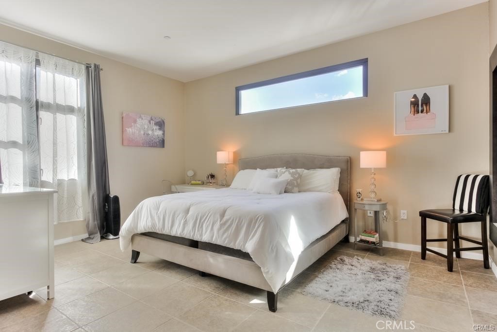 TOP FLOOR CORNER LOCATION! Live downtown in LUXURY and STYLE! Ultra Modern huge 920 sqft open spaced loft style condo! Upgraded with 5 star appointments.
Treat yourself to custom lights & paint! Lots of natural light.
Tile throughout, No Carpet! Stainless steel appliance package with large upgraded open spaced granite gourmet kitchen. Gas Stove!
Modern floating living room TV consule.
Towering top floor balcony with ultimate city, neighborhood and mountain views!
2 extra unique corner location sky windows in located in the bedroom and living room.
Huge bedroom area. 1 assigned gated underground parking space with complementary guest parking.
FIOS internet and basic expanded cable included.
The building offers a trendy modern clubroom complete with TV, sofas, pool table, shuffle board, full size kitchen, outdoor social patio bar and courtyard lounge area with fireplace. A modern gym/fitness center, yoga room, TV’s.
0-5 blocks away from everything!(Promenade, beach, boardwalk, restaurants, museums, grocery stores, shopping, freeways & entertainment, annual Grand Prix, Laugh Factory, The Pike, Nike, H & M outlets, marina, Queen Mary, jet skis & boat rentals, paddle boarding, Pine Ave, Belmont Shores & more!)