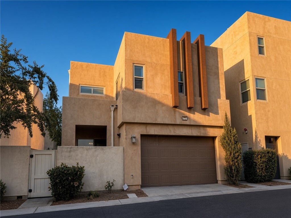 Photo of 122 Interval, Irvine, CA 92618 (MLS # OC26216206)