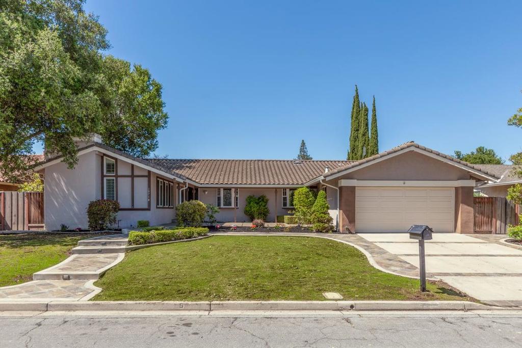 This beautifully maintained single-story home features 4 bedrooms, 2 baths, formal living and dining rooms a separate family room, a dedicated office, and an inside laundry room with washer and dryer. The spacious primary bedroom offers vaulted ceilings, abundant natural light, double pane windows and direct access to the back patio, pool, and spa. The updated kitchen overlooks the backyard and pool area and features granite countertops, stainless steel appliances and hardwood flooring. Additional highlights include an oversized 2-car garage, central A/C, and forced air heating. Conveniently located near Highway 85, shopping centers, and highly rated Saratoga schools! Photos are from 2024 when home was professionally staged.