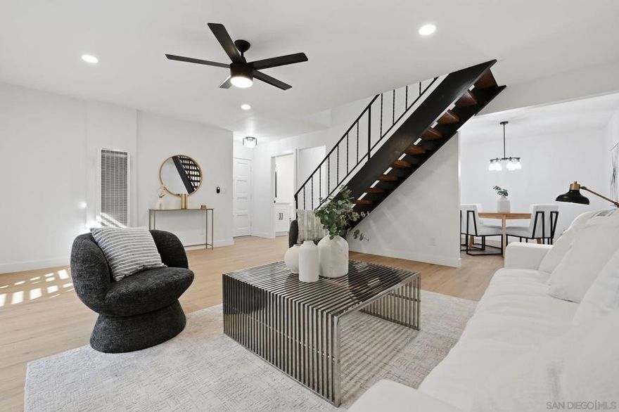 Beautifully renovated corner-unit townhome featuring modern upgrades and an exceptional indoor/outdoor living experience. This move-in–ready home offers an open and bright floor plan with updated flooring, fresh paint, and recessed lighting throughout. The remodeled kitchen showcases sleek cabinetry, quartz countertops, stainless steel appliances, and ample storage. Upstairs, you’ll find spacious bedrooms with upgraded fixtures and refreshed bathrooms with contemporary finishes. The primary bedroom provides generous closet space and great natural light. Enjoy one of the largest patios in the community; perfect for entertaining, relaxing, or creating your own outdoor oasis. Additional highlights include in-unit laundry, dual-pane windows, and an assigned parking space. Located in a well-maintained community close to shopping, dining, parks, schools, and convenient freeway access. This turnkey townhome offers comfort, style, and convenience in the heart of National City.