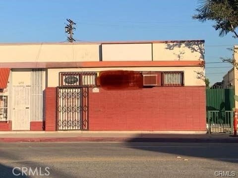Photo of 6350 Miles AVE, Huntington Park, CA 90255 (MLS # DW26183711)