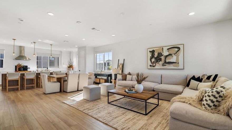 Welcome to 4700 Parsley Lane, a modern coastal retreat built in 2025 and located in one of Carlsbad’s most sought-after communities, with this home being arguably the best home within the entire development.  This beautifully upgraded 4-bedroom, 3.5-bathroom home offers 2,212 sq ft of bright, open-concept living designed for comfort, style, and functionality.  Inside, you’ll find a thoughtfully designed floor plan featuring a gourmet kitchen, with high-end Wolf appliances, a Sub-Zero refrigerator, quartz countertops, shaker-style soft-close cabinetry, and luxury vinyl plank flooring throughout. The main living area is filled with natural light and flows seamlessly, perfect for both entertaining and everyday living.  Ideal for multi-generational needs or guests, a private downstairs bedroom includes its own en-suite bath. Upstairs, the primary suite offers a serene escape with a spacious walk-in shower, dual vanity, and a generous walk-in closet. Additional bedrooms provide lots of flexibility. The laundry room is conveniently located on the third floor.  Notable upgrades include owned solar panels, a 2-car garage with EV charger, a whole-home water filtration system, and alkaline drinking water, delivering both sustainability and modern convenience. The low-maintenance yard pairs perfectly with resort-style community amenities such as a pool, spa, dog park, and playground.  Enjoy an active lifestyle just minutes from Agua Hedionda Lagoon and Tamarack Beach, with easy access to top-rated schools, scenic trails, shopping,