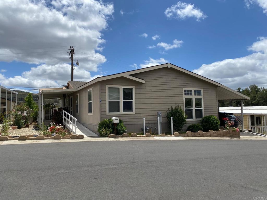 Beautiful 2005 manufactured home in a 55/18 ages community. Magnificent 1680sf floor plan with large rooms throughout. Highly desired split-floorplan with the main bedroom/bathroom at one end of the home, while the other bedrooms and bathroom sit at the opposite end. Beautiful kitchen features loads of cabinets and counter space, an island, a large pantry and all appliances will be included with the sale. There is a formal living room and dining room. This home has an amazing step-down into bonus room which would make a great TV room. The main suite offers a very large walk-in closet and an ensuite bathroom with dual sinks, a garden tub and a shower stall. Spacious rooms throughout. Enjoy your morning coffee or afternoon tea on your own covered deck. Large yard and custom built storage shed. LBH4089. $1,280 lot rent. Monterey Mobile Lodge is a beautifully kept adult 55/18 community. It offers its residents a beautiful clubhouse and a swimming pool. Come tour this home and make it your own! LBH4089.