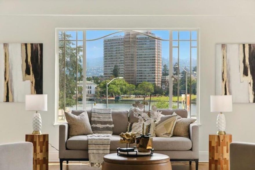 Modern elegance meets lakefront living in this beautifully remodeled 3 bed, 3 bath condo perched above Lake Merritt in one of Oaklands most iconic buildings. Flooded with natural light, this spacious home blends historic charm with refined updates, including a chef-inspired kitchen with an oversized quartz island, custom cabinetry, and stainless steel appliances. Each bedroom enjoys its own updated bath, offering privacy and flexibility for guests, multigenerational living, or a dedicated work from home retreat. The serene bedroom suites features a spa-style ensuite bathrooms. Enjoy calming lake views from the unit's common areas. Additional upgrades include refinished hardwood floors, designer lighting, upgraded hardware and fixtures. Secure building with on site parking, elevator access, and security. Steps from the lakefront trails, dining, markets, and easy BART and freeway access - a rare opportunity to experience elevated lakeside living at the heart of Oakland.