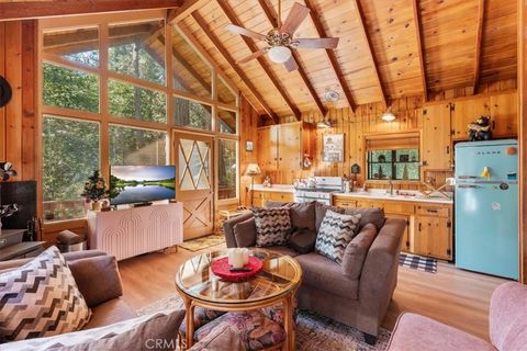 Photo of 697 Mormon Springs Rd, Crestline, CA 92325 (MLS # CV26076775)