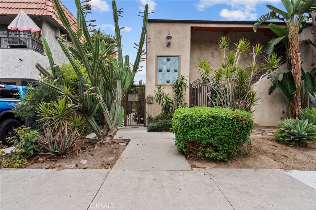 RARE level of privacy in condo living -- END UNIT with NO ONE ABOVE OR BELOW, offering a quiet, peaceful retreat in the heart of Valley Village. Light and bright with high ceilings, the space feels open and inviting. Recent updates include fresh paint and newer laminate flooring. The living room opens to a private balcony and connects seamlessly to a cozy dining area. Remodeled kitchen features granite countertops, newer cabinetry, stainless steel appliances including a brand-new oven (installed August 2025), stainless steel dishwasher, and newer microwave. Down the hallway, the bedroom is located next to the tastefully updated bathroom which features a skylight. Low monthly HOA dues include a refreshing community pool, as well as fire and earthquake insurance. There is a dedicated parking space beneath the unit, along with two private storage cabinets, and just steps away is the community laundry. Located on a quiet residential street, yet close to freeway, shopping, and dining, this home combines modern comfort and unbeatable convenience. Don’t miss this unique opportunity!