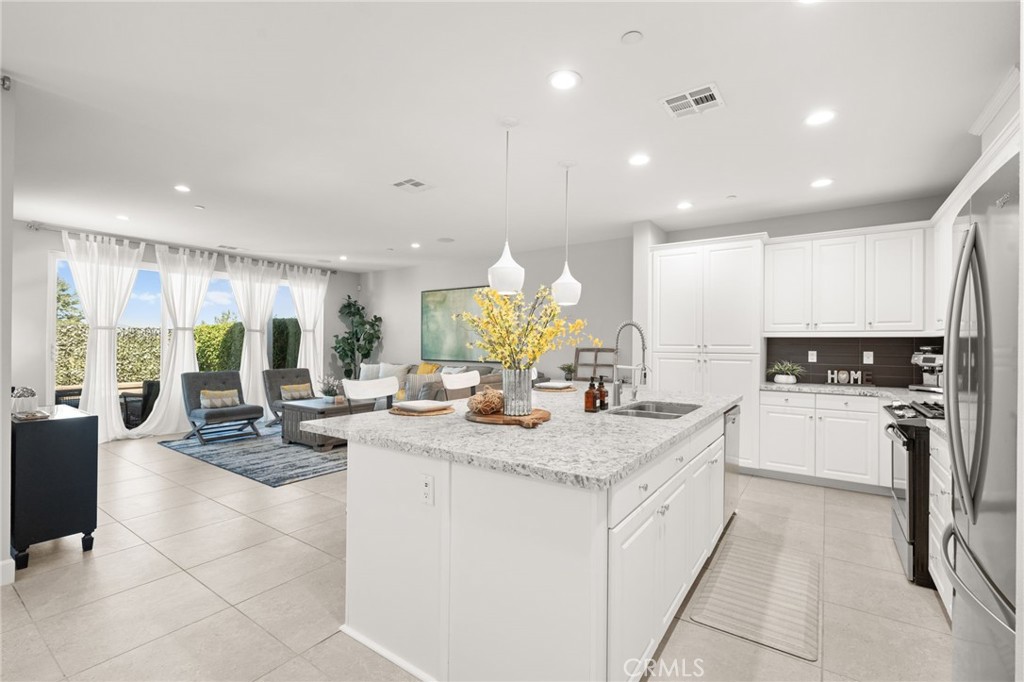 Dreamy Formal Model Prime Lot Home!!
This former model home located in one of East Murrieta's most desirable and peaceful communities, is more than a house — it’s a retreat designed for comfort, style, and effortless living. Featuring 3 spacious bedrooms, 3 baths, and an office on the first floor that can be converter into a fourth bedroom. Inside, the open layout welcomes you with warm natural light, upgraded flooring, custom countertops, custom cabinetry and a cozy fireplace.
The kitchen featuring an upgraded chef's kitchen with its inviting island and seamless flow into the living and dining areas, is perfect for quiet evenings or lively gatherings. The primary suite feels like a personal sanctuary, offering two walk-in closets and a private balcony where you can take in peaceful views. Below, the balcony serves as a shaded patio — extending your living space into the backyard.
Step outside to your very own escape: a tranquil water feature, fire pit, and beautifully porcelain tile finishes that set the tone for relaxation and connection. Whether enjoying your morning coffee to the sound of flowing water or hosting friends under the stars, this backyard is pure serenity.
Additional features enjoy the comfort of a whole-house water softener filtration system, in-ceiling sound system, efficiency of solar and a Tesla EV charger, and custom upgrades throughout. The property features a spacious 2-car garage with epoxy flooring plus extra space area perfect for a home gym, workshop, or extra storage.
Benefits of living in this well-maintained HOA Brighton community includes walking trails, a large open grass area, a private fenced dog park, and beautiful mountain views. Located within walking distance to top-rated elementary and middle schools, only ten minutes to Temecula wineries. This home also enjoys easy access to shopping, dining, as well as quick access to the 15FWY/215FWY and HWY 79
VA ASSUMABLE LOAN OPTION rate @ 2.75% with loan balance of $599K
