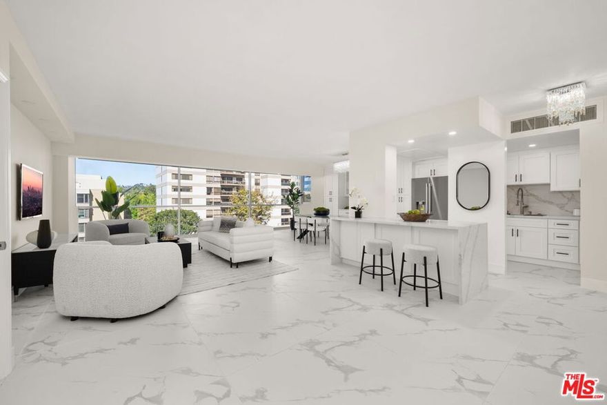 Welcome to this luxurious 2-bedroom, 2-bath residence, exquisitely redesigned and located in the heart of the Wilshire Corridor. Capturing the essence of modern luxury living, this front-facing home offers breathtaking city and mountain views, enjoy stunning sunsets from the living room and the glittering city lights at night. The open-concept floor plan is ideal for entertaining, featuring a newly renovated designer kitchen with quartz countertops, stainless-steel appliances, custom cabinetry, recessed lighting, and new flooring throughout. Additional highlights include high ceilings, floor-to-ceiling windows framing the panoramic vistas, and an in-unit washer and dryer for added convenience. Two spacious bedrooms and two beautifully updated baths provide exceptional comfort and style. Situated in The Churchill, one of the Wilshire Corridor's premier full-service buildings, residents enjoy 24-hour valet and concierge, controlled access, a resort-style pool, fitness center, lounge, recreation room, and on-site management. HOA dues include all utilities and basic cable. Conveniently located near UCLA, Westwood, Century City, and Beverly Hills.