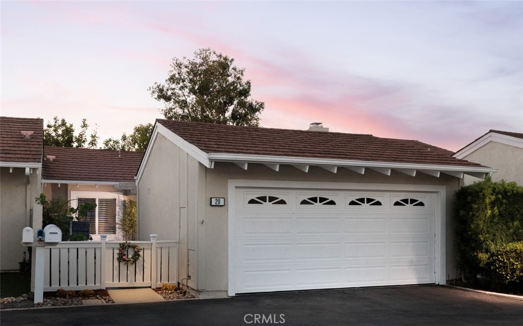 Charming bungalow-style residence in the highly desirable Woodbridge area of Irvine. Nestled on a tranquil cul-de-sac, this 2-bedroom, 2-bath home has been thoughtfully remodeled and updated to perfection, combining classic curb appeal with modern comfort. The sun-drenched living space welcomes you with wide-plank flooring, abundant natural light, flowing seamlessly into a pristine kitchen complete with granite countertops, stainless steel appliances, and a stylish farmhouse sink. The primary suite offers a serene retreat with a refreshed ensuite and a generous closet, while the second bedroom provides flexibility for guests or a home office. Both baths have been updated with contemporary finishes, upscale fixtures, and tasteful detailing. An ideal layout for everyday living and entertaining, the home also features ample storage, recessed lighting, and designer touches throughout.Outside, enjoy a private, low-maintenance outdoor area—perfect for morning coffee or evening gatherings—plus easy access to the great Woodbridge lifestyle. You’ll be moments from scenic lakes, trails, pools, tennis courts, and a vibrant village atmosphere, all within one of Irvine’s most coveted communities.