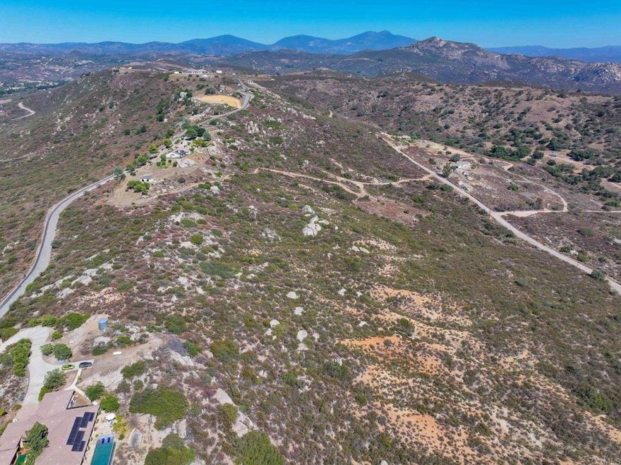 Big Views, Big Dreams! Prime 8+ acre lot perched along the ridgeline with breathtaking 270-degree panoramic views! Off paved road.This one-of-a-kind property offers several usable acres—perfect for your dream home, a vineyard, or a peaceful retreat. Come experience the best of Ramona’s natural beauty with endless skies, stunning sunsets, and room to roam. Land like this doesn’t come around often—come walk it and fall in love!