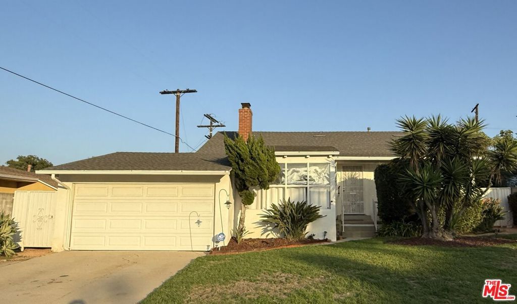 Photo of 3810 S Dunsmuir Avenue, Los Angeles, CA 90008 (MLS # 25615149)