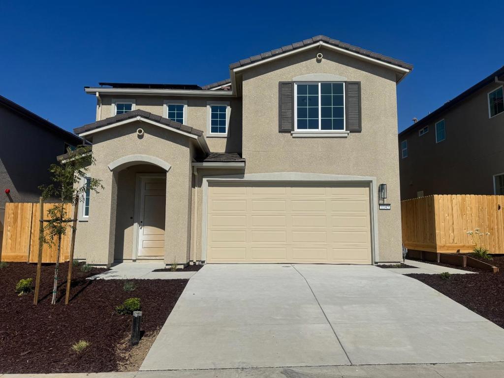 Welcome to this lovely 3-bedroom, 2.5-bathroom home located in charming Hollister. Spanning 1,664 square feet, this residence offers a comfortable and functional layout ideal for family living. The kitchen/family room combo is perfect for gatherings, featuring ample space and a seamless flow into the dining area situated within the family room. Enjoy the convenience of modern amenities, including central air conditioning and ceiling fans, ensuring comfort throughout the year. The flooring is a blend of carpet and laminate, providing both style and practicality. On cooler evenings, cozy up next to the inviting fireplace in the family room. The home is equipped with a laundry area for added convenience. Set in the Hollister Elementary School District, this property is ideally positioned for families seeking proximity to educational institutions. Additional features include a 2-car garage, offering ample storage and parking space. Don't miss out on the opportunity to make this your new home in Hollister! LOT 110 includes $15,499 in upgrades, including window treatments.