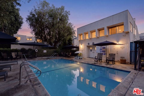 Photo of 18411 Hatteras Street #246, Tarzana, CA 91356 (MLS # 26874311)