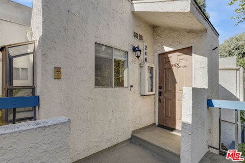 Photo of 18411 Hatteras Street #246, Tarzana, CA 91356 (MLS # 26874311)