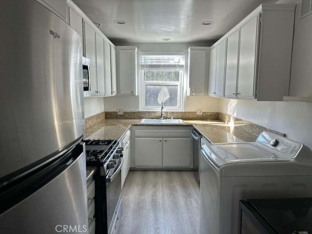 Photo of 11670 W Sunset Blvd. Blvd #212, Los Angeles, CA 90049 (MLS # SR26005858)