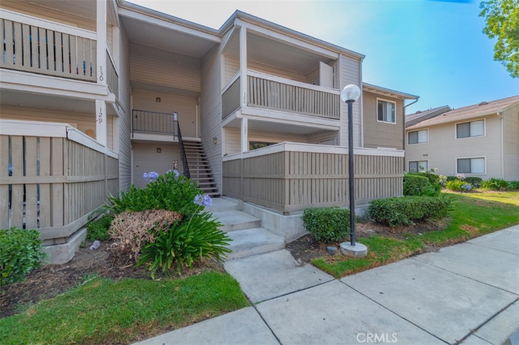 Located in a quiet, gated community, this single-story condo at 1309 W Mission Blvd #127 in Ontario offers a refreshed living space with modern updates. Spanning 949 square feet, the residence features 3 bedrooms and 2 bathrooms. The interior has been recently upgraded with brand new vinyl wood flooring, new fixtures, and new paint throughout. The kitchen is equipped with a new over-the-range microwave. For added convenience and a contemporary feel, new lights and recessed lights have been installed.
The property includes two covered carports located just steps from the front door. Residents of this community enjoy a tranquil environment and amenities such as a pool, spa, and tennis courts. The location is highly accessible, with restaurants within walking distance and major freeways just a 5-minute drive away. **This complex is NOT FHA Approved**