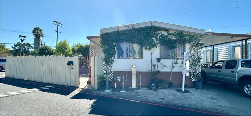 Welcome to a charming manufactured home located in the center of San Jose. This home offers a comfortable and practical living space with 1,120 sq ft, comprising 2 bedrooms and 2 full bathrooms. The kitchen is equipped with a refrigerator, making meal preparation convenient and efficient. The flooring throughout the home includes both carpet and laminate, providing a blend of warmth and durability.  Laundry tasks are made easy with an included washer and dryer, ensuring convenience and efficiency in your daily routines. The home is located near the bus station, market, church, school, and restaurants. Don't miss the opportunity!!!