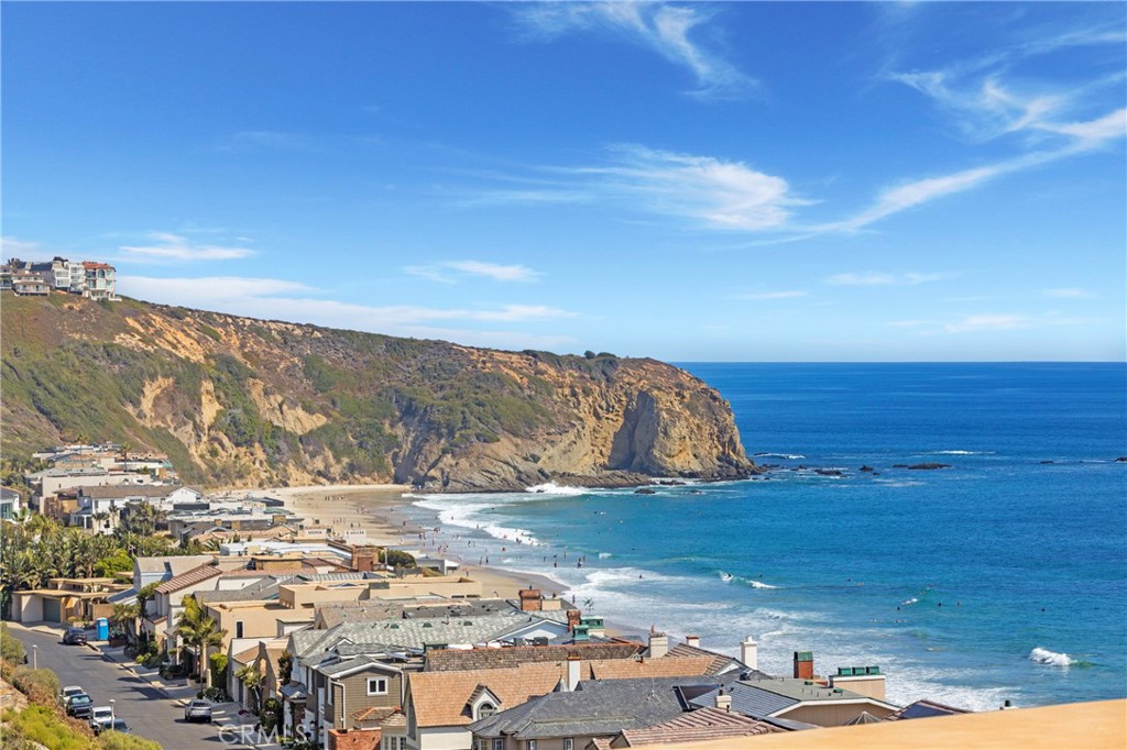 *NEW CONSTRUCTION* (TO BE COMPLETED WINTER OF 2025) This shall be an exquisite custom "White Water, Sand, Ocean View" home located in the exclusive 24-hour guard gated Oceanfront Community of Niguel Shores. This custom residence to be built by "Nicholson Companies" of Newport Beach contains approximately 4624 sqft, 4 bedroom, 4 full bath & 2 "1/2 baths", in addition, this custom-built home contains an approximate 500sqft "California Room". This residence is designed to maximize Southern California lifestyle with “indoor/outdoor“ living & stunning ocean views! This open & spacious floorplan will feature a “great room“ with uninterrupted views through a wall of multi panel, sliding glass doors!… The “main floor master suite “possesses outstanding, ocean views, contemporary fireplace, generously sized walk-in closet, spa-like bath, freestanding soaking tub, Kohler faucets and toilets, and a “frameless clear glass shower enclosure". The Gourmet “center island kitchen” will feature “Miele” appliances inclusive of refrigerator & freezer, 48” 8-burner gas range with integrated microwave and warming drawer, dishwasher as well as “quartz "counters, undercabinet lighting, and custom cabinetry with selected pulls from Emtek! Additional interior features will include soffit & elevated ceilings, wire-brushed white oak engineered hardwood flooring throughout, hardwood stair treads & risers with custom steel or wood rail system, 8-foot solid core interior doors, 6-inch baseboards… Custom elevator, a second contemporary linear fireplace in the living/dining area, interior sprinkler system, Epoxy covered coating & prep for "e-charger" in 3-car garage, CAT7 ethernet wire, professionally designed DCS security system with touchscreen panels & security sensors throughout, energy efficient HVAC air conditioning system, HEPA air filtration system, air quality sensor technology, smartphone app technology, reverse osmosis drinking water & whole home water filtration system. Exterior features will include a smooth stucco exterior, custom oversize front door system, with complimenting garage doors. Exterior landscaping will be inclusive of professional planting of all yard areas, automatic irrigation & drainage system, custom landscape lighting package, and a 36-inch built-in barbecue. This custom built residence will share a cul-de-sac location with only 3 additional homes. Walking distance to the Pacific Ocean & surfing breaks are minutes away! Truly an incredible opportunity!!