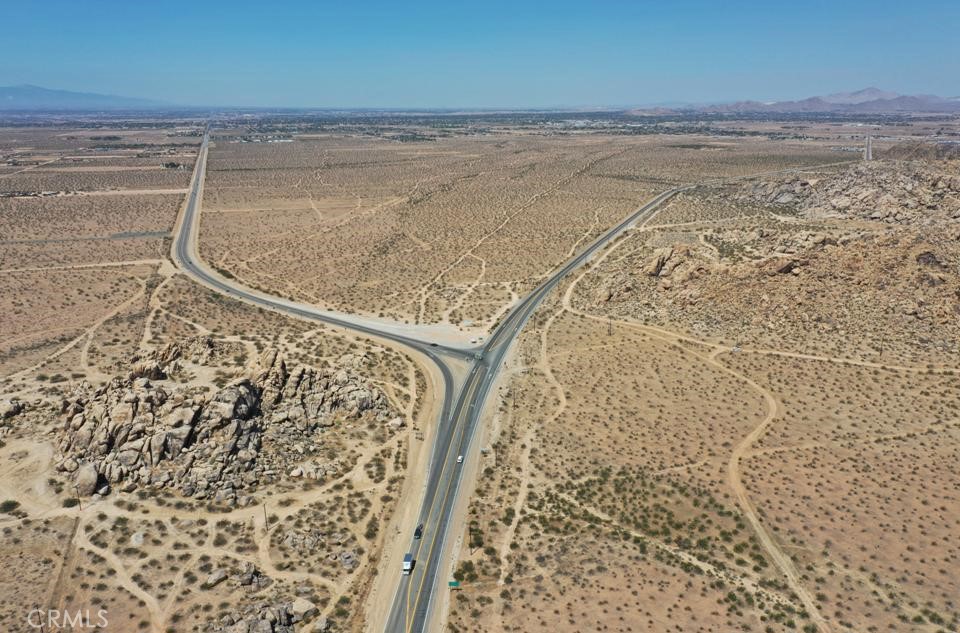SELLER WILL ACCEPT BITCOIN!
LOCATION: Hwy 18 and Bear Valley Rd. in the unincorporated area of east Apple Valley, CA PRICE: $2,900,000 / $19,594 per acre
APN: 436-153-16,17,18
UTILITIES: Buyer to confirm for buyer’s intended uses COMMENTS: -- Excellent visibility and access from Hwy 18. and Bear Valley Rd. -- This is the only easterly access into and out of the Victor Valley. -- All or part can be sold. -- Seller will carry with 20% down. ZONING: Multiple uses to consider. Contact the San Bernardino County Planning Department. Bear Valley Rd NORTH Surrounds the entire intersection