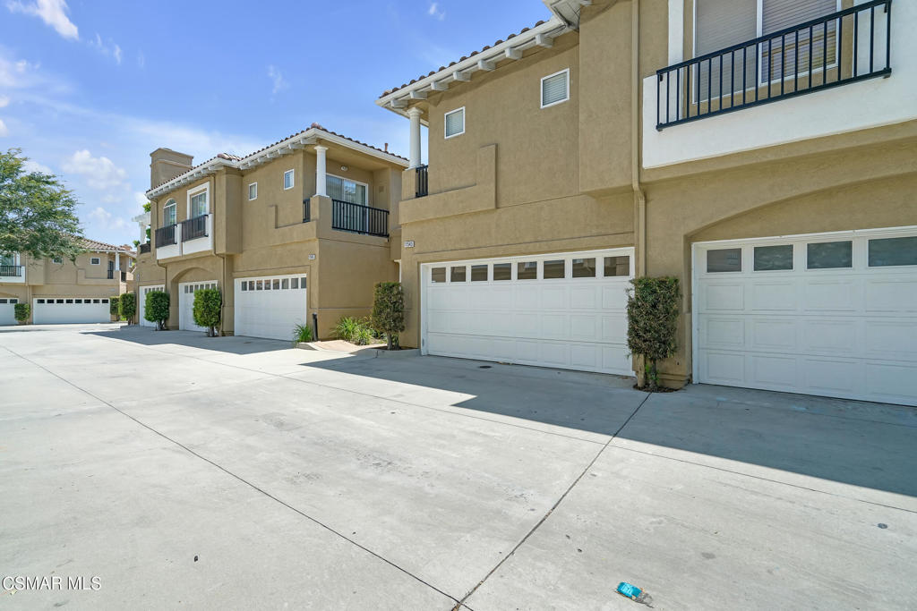 Updated 2 bed 2.5 bath newer townhome in prime location with 2 car garage in Traditions community ! Spacious and open living room with vinyl plank wood floors and gas fireplace! Large windows and sliders give the unit a special brightness! Modern kitchen offers sleek black granite counters, euro white cabinets, tile floors and recessed lighting! Indoor laundry area. Powder room (1/2 bath) downstairs and 2 upstairs full baths offer matching black granite counters and white cabinets! Large master suite has double sinks and spacious tile shower, plus walk-in closet! Private patio is perfect for morning tea or coffee! The Traditions community includes a community pool and spa, parks, and is a short stroll to award-winning Moorpark schools, shopping and restaurants. So many scenic walking paths and numerous parks nearby. MUST SEE!