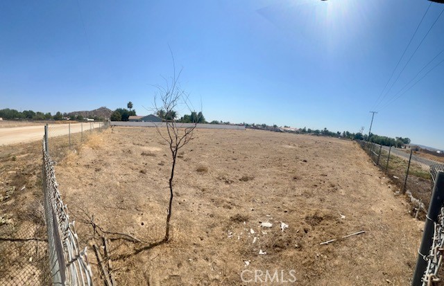 Great opportunity to own two parcels of vacant land in Menifee! Located on a prime corner lot at Ellis Ave. & Pico Ave., the property includes one parcel of 3,920 sq. ft. and another of 52,708 sq. ft., totaling 56,628 sq. ft. of flat, mostly fenced, usable space bordering Pico Avenue and Ellis Avenue. Zoned RR (Rural Residential), with potential to build a main home plus detached and attached ADUs (buyer to verify with the city). Conveniently close to I-215, shopping, dining, and top schools. A perfect spot to bring your vision to life in a thriving community!