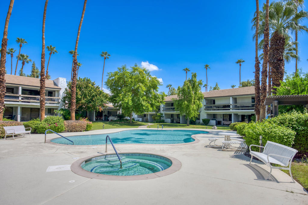 Charming 2-Bed, 2-Bath in Palm Canyon Villas ...Welcome to this inviting condo offering a warm and comfortable layout. Both bedrooms are spacious, and the bathrooms are nicely finished for everyday ease. The home features in unit washer and dryer, an assigned carport space, and a private patio overlooking peaceful green space. Located just steps from one of the sparkling community pools, this property is ideal for enjoying resort-style living. Residents also have access to spas, tennis courts, and more.Currently, 5-day short-term rentals are allowed (to be verified with the City of Palm Springs), making this an excellent weekend retreat or investment opportunity. Set on FEE land with no lease payments, the condo is conveniently close to shopping, restaurants, services, and Palm Springs International Airport--offering both comfort and incredible convenience. Come see it !