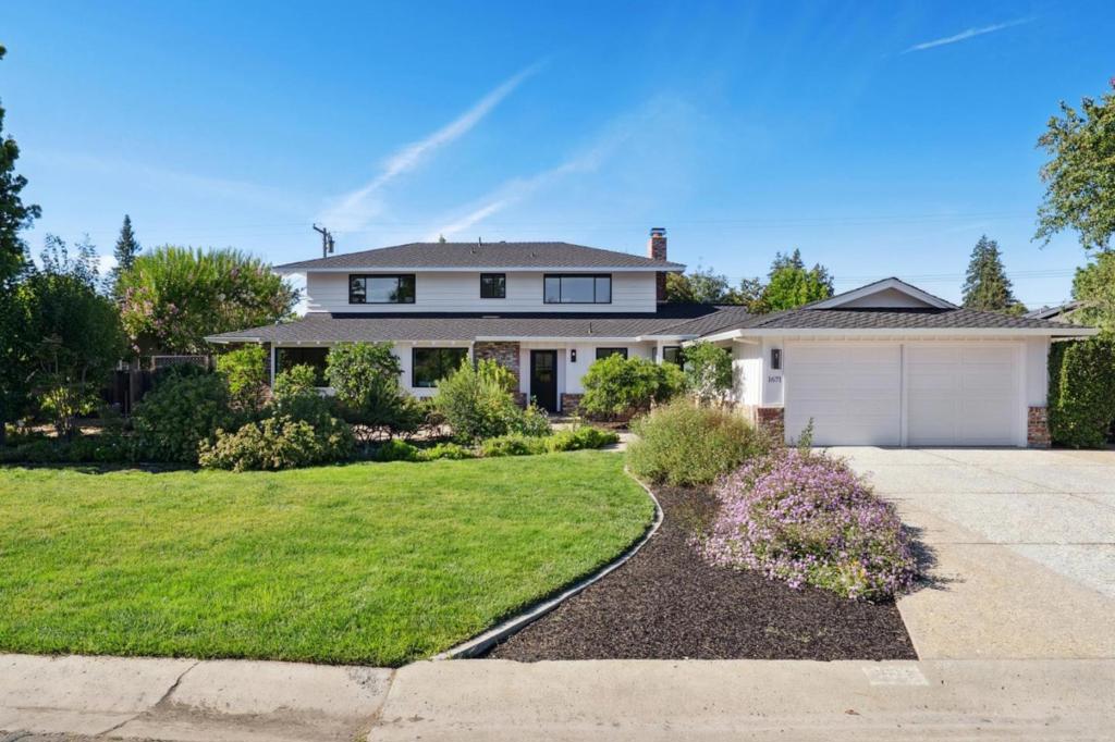 Located on an excellent street in South Los Altos, this extensively remodeled home offers two spacious levels with designer finishes throughout and a sparkling pool. A welcoming extra-deep front yard with fruit trees and patio introduces the home, where new engineered wood floors, fresh paint inside and out, designer lighting, and remodeled kitchen and baths enhance the modern ambiance. The formal living room and dining room is designed for entertaining, with built-in cabinetry that includes a wine cooler and sink. A brick wall divides the space from the kitchen, with fireplaces on both sides adding warmth and character. The remodeled kitchen is a true focal point, featuring porcelain countertops, waterfall-wrapped island seating, and new high-end appliances. With 6 bedrooms, an office, and 4.5 baths, the layout easily supports a variety of lifestyle needs. The upstairs primary suite offers a spa-like retreat with dual closets and a bathing area with free-standing tub and open shower. Two additional bedrooms are located upstairs, while three more including a guest suite are found on the main level. The backyard is designed for outdoor living with a sparkling pool, expansive patios, and low-maintenance landscaping. Top-rated Cupertino schools and oversized 450 SF 2 car garage.