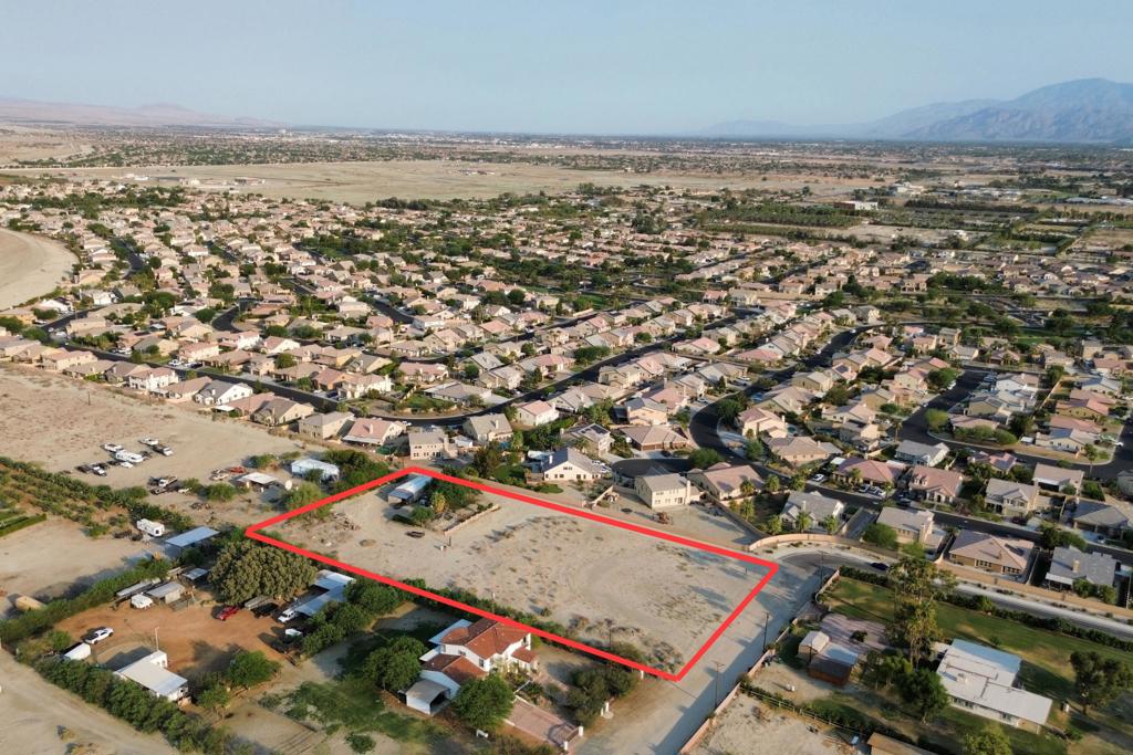 Attention Developers and Investors! Here is your chance to own a prime piece of land in North Indio. This 2.5 acre parcel right behind the Talavera community currently has a 3 bed, 2 bath manufactured home that has electricity, well water, and natural gas.This property is just minutes from the local Middle and High Schools. North Indio is EXPLODING with growth and is one of Riverside County's fastest growing cities. Located just minutes from the world famous music festivals, Riverside County Fairgrounds, Acrisure Arena, world class golf, including the Coachella Valley's ONLY night golf course, and the newly revitalized downtown area that is home to new eateries and breweries! With easy access to the freeway, you'll be just thirty minutes from downtown Palm Springs, an hour away from Joshua Tree, or a few hours away from San Diego, Los Angeles, and Orange County! The opportunities are endless with this parcel of land. Don't miss this opportunity! Schedule your showing today!