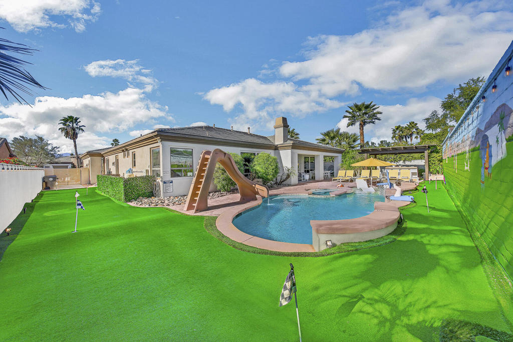 Discover the Ultimate Desert Escape in Montage!Step into this fully renovated six-bedroom showstopper, designed from top to bottom with Airbnb guests in mind. With over $250,000 in luxury upgrades, this home delivers the perfect blend of style, entertainment, and resort-style amenities.Inside, you'll find stunning designer decor and a high-energy climate controlled game room loaded with arcade-quality entertainment. Thoughtfully designed for families and groups, the layout includes a private master suite with a cozy adjacent kiddy bedroom--perfect for parents traveling with little ones.Step outside and let the fun take over--dive into the sparkling pool with its exciting water slide, chill out with dual misting systems that keep things cool both in and out of the water, and challenge your crew to a round on the 8-hole mini golf course. Enjoy your very own Bocce Ball/Soccer/Cornhole arena--an all-in-one backyard playground under the desert sun.'Perfectly located just a short walk to the Polo Grounds--home of Coachella and Stagecoach, this home sits in one of the top-performing Airbnb neighborhoods in the Coachella Valley for six straight years. You're also minutes from world-class golf, the Indian Wells Tennis Garden, and iconic Joshua Tree.Tucked inside a safe, gated community where short-term rentals are fully permitted, this property offers not just unforgettable experiences--but serious passive income potential.Whether you're seeking the ultimate vacation retreat or a high-yield investment, this Montage gem checks every box. Luxury. Location. Lifestyle. This is the one.