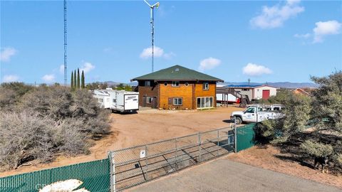 Photo of 10328 El Centro Rd, Oak Hills, CA 92344 (MLS # HD26033453)