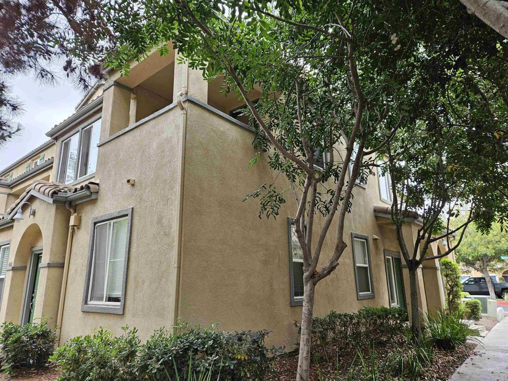Don't Miss This Exceptional Opportunity! This move-in ready, end-unit condo is the total package—and a must-see for every serious buyer and agent! Offering 3 spacious bedrooms, 3 full bathrooms, and 1,459 sq. ft. of beautifully maintained living space, this home checks every box. Enjoy ultimate privacy and tranquility with lush greenery surrounding the home and a secluded back deck perfect for relaxing. The open-concept kitchen is modern and bright, seamlessly flowing into a large family room featuring a cozy fireplace—ideal for gathering with family and friends. This unit stands out with TWO separate 1-car garages, plenty of storage, and a full-sized laundry room. Perfectly located with easy access to freeways, shopping, dining, and more, this home is ideal for those who want convenience without sacrificing comfort. Act fast—this gem won’t last long! Schedule your showing today and make sure your buyers don’t miss out.