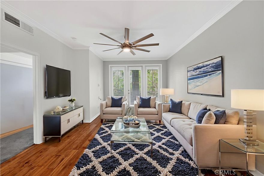 Experience luxury living in one of the safest places to live in Irvine! Welcome to 2243 Martin, Unit 107, located in the highly desirable Metropolitan community, just a short walk to John Wayne Airport. This stunning end-unit condo offers privacy with only one shared wall and an open layout designed for modern living.

Inside, you’ll find upgraded quartz countertops in both the kitchen and bathroom, custom Elfa shelving in the den/office or turn into 2nd bedroom, elegant crown molding, and a designer bedroom chandelier. The spacious den features custom 10-ft closet doors with extra storage, while the home is enhanced with motorized LED lighting with remotes and plantation shutters throughout. Garage parking step away from stairs and elevator 

Relax on your private balcony overlooking the tranquil greenbelt or enjoy the resort-style amenities at The Metropolitan: a sparkling heated pool, spa, fitness center, elegant clubhouse, and lush landscaped grounds perfect for an evening stroll. The community also offers 24/7 gated security, underground parking, and HOA coverage of water, gas, and trash for peace of mind.

Nestled in the heart of Irvine, you’ll be minutes from top-rated parks, recreation, world-class shopping, dining, and beaches.

Don’t miss the chance to own this beautifully upgraded home in one of Irvine’s most sought-after communities!