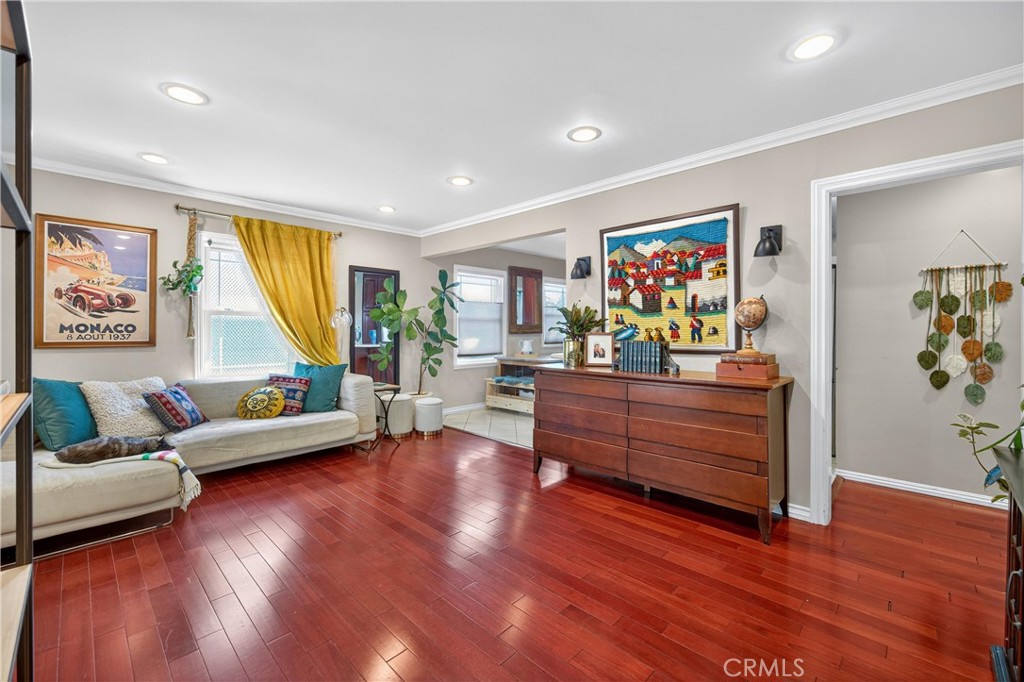 This beautifully maintained home blends modern upgrades with timeless charm. Step inside to find gleaming hardwood floors, upgraded appliances, and the comfort of a new tankless water heater along with a full copper re-pipe for lasting peace of mind. Double-pane windows fill the home with natural light while enhancing energy efficiency.
Outdoors, enjoy a thoughtfully designed yard with water-wise landscaping, a private putting green, a vegetable garden, and even a chicken coop—perfect for those who love fresh, sustainable living. Additional highlights include, Bonus finished 3rd room attached to the carriage house, ideal as a studio, office, or guest retreat. Pre-approved ADU and 3rd bedroom permit, offering excellent potential for added living space or rental income. A tree-lined street with mature shade trees and a welcoming neighborhood feel. Just minutes from the Downtown Santa Ana Arts District, with dining, shopping, and cultural attractions close at hand. Set on a generous lot, this home offers plenty of room to personalize, expand, or invest—all within a stable, established neighborhood