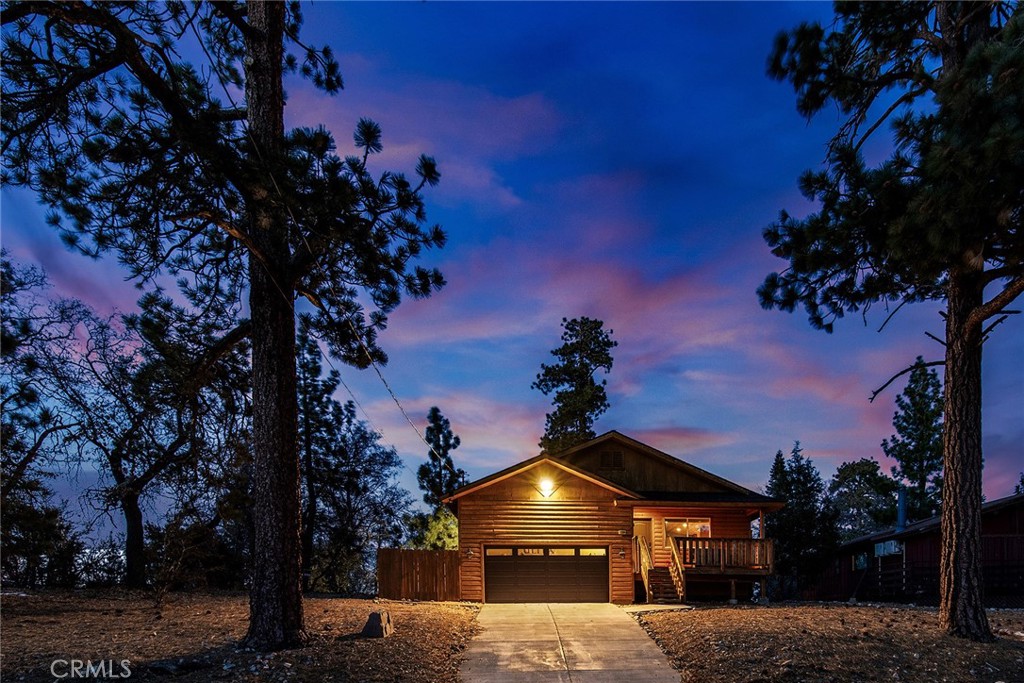 Embrace the joys of mountain living in this charming Big Bear home! Built in 2018, this residence offers a perfect blend of modern comfort and rustic charm, providing an ideal retreat for nature enthusiasts and adventurers alike.
Step inside to discover a welcoming open-concept living space, perfect for cozy evenings by the fireplace or entertaining friends and family. The kitchen, featuring sleek granite countertops and ample storage, is a delight for any home chef.
Outside, the expansive lot invites you to enjoy the breathtaking natural beauty that surrounds you. Imagine starting your mornings with a refreshing hike on nearby trails or taking a short drive to Bear Mountain Ski Resort for a thrilling day of skiing. In the warmer months, enjoy rounds of golf or a visit to the nearby zoo for endless exploration and fun.
With a spacious two-car garage, this home is truly turnkey, blending convenience with style. Whether you’re relaxing after a day of adventure or planning your next outdoor outing, this home is your perfect base for embracing the vibrant mountain lifestyle!