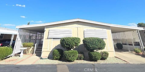Photo of 14000 El Evado Rd SPC 48 RD, Victorville, CA 92392 (MLS # HD26217390)