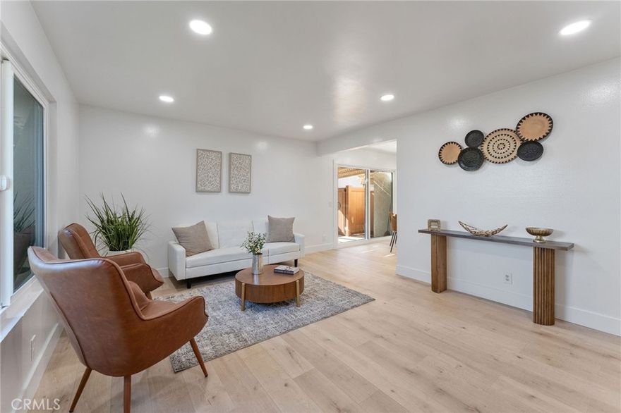 Welcome home to one of the best values in orange county. This single story Condo with private patio yard is perfect for any one just starting out in their first home or perhaps downsizing to that cozy single story for the next chapter, this home is perfect. The highly renovated unit features new flooring, fixtures, lighting and paint throughout. There are 3 spacious bedrooms, 2 baths and a very open and upgraded kitchen family room concept. Easy access to shopping and freeways. Act now and enjoy your new home just in time for the holidays.