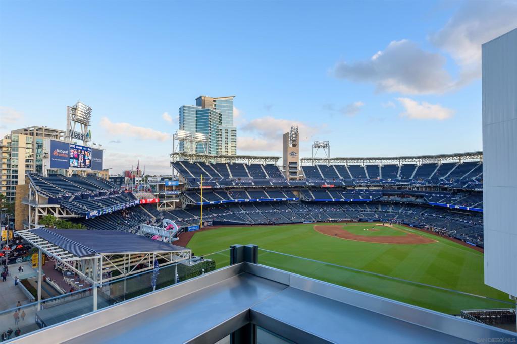 Welcome to The Legend, a luxury condo high-rise located within the boundaries of Petco Park! Offering unparalleled access to Petco Park and Gallagher Square, this 2 BR/2BA residence features brand new flooring, stunning city views, large window walls allowing for ample natural light, a spacious private balcony, 1 parking space and a storage unit. The Legend offers full service amenities including an incredible viewing deck that is a front row seat to all that Petco Park has to offer, from ball games to concerts, there's something for everyone! The building also offers a fully equipped gym, a pool & spa, outdoor fire pits, and outdoor kitchen. Conveniently situated, The Legend is surrounded by top-rated restaurants, coffee shops, nightlife, boutique stores, and is just minutes from major freeway access. Embrace the ultimate downtown lifestyle!