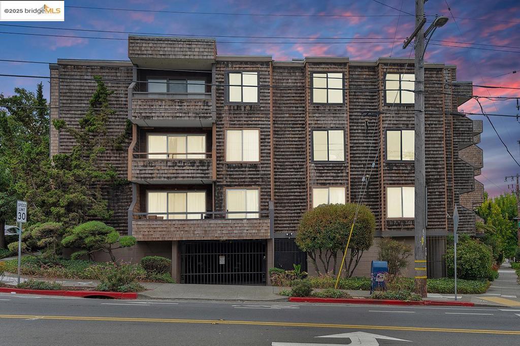 Welcome to 696 Athol Ave #203! Step into this lovely 2-bed, 2-bath corner unit gem of a condo with an in-unit washer and dryer! Enjoy the open floor plan, and a sunny deck. This is a great home for everyday and entertaining! The primary bedroom leads into an ensuite bathroom, open closet, and the in-unit washer-dryer. The second bedroom has an ample closet and storage space. There is a beautiful rooftop to lounge in and a one-car parking spot in the gated garage. Newly painted interior throughout. Located in Cleveland Heights just up the hill from Lake Merritt. Situated near restaurants and shops on Lakeshore and Grand Ave, public transportation, and the freeway.