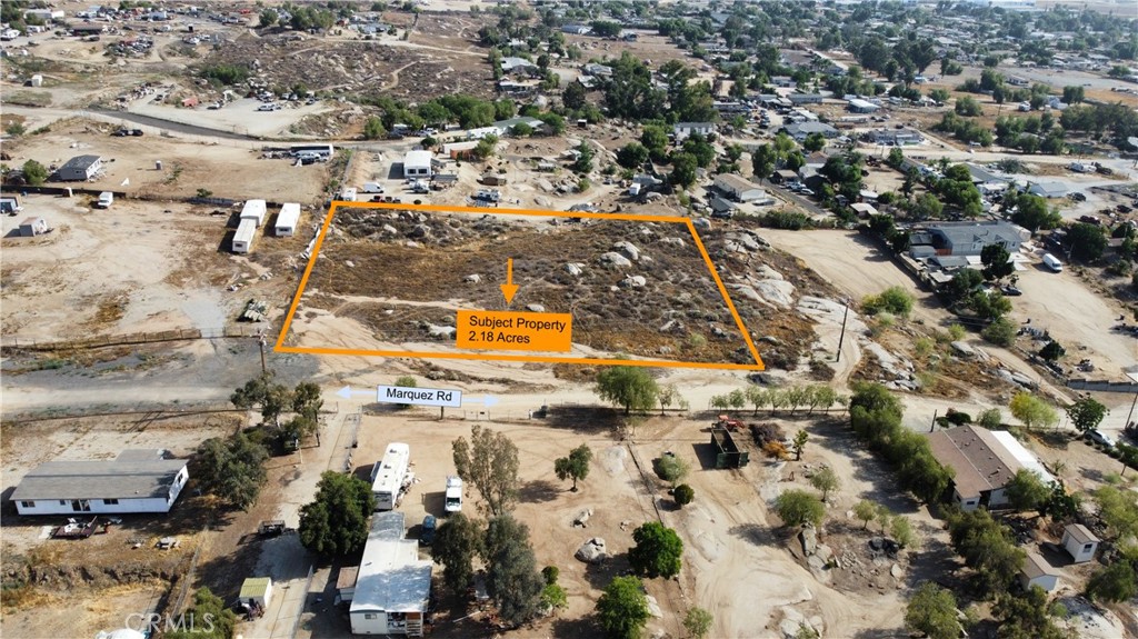 Great location!!! Close to the major street of Cajalco Rd, with easy freeway access.
This property is suitable for mobile homes, has potential to subdivided into 2 lots. Currently, there are no utilities available, but a public electricity line runs next to the property, however there are no public water or sewage lines. This is a great opportunity to own such a large piece of land!!!!