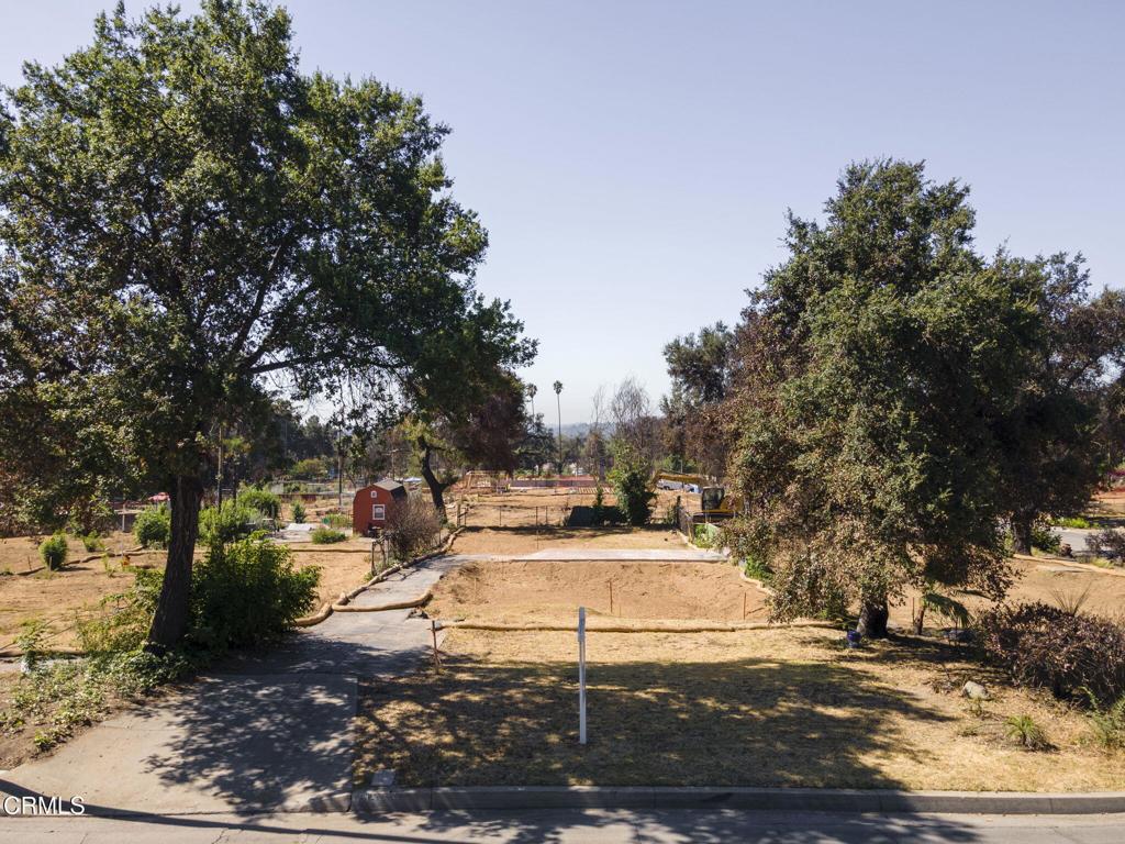 Located in a beloved Altadena neighborhood just minutes from Pasadena, this property offers a rare opportunity to rebuild in a setting prized for its charm and convenience. Formerly home to a 2-bedroom, 1-bath residence with 1,075 square feet, the lot was impacted by the Eaton Fire and has since been cleared, providing a blank canvas for your vision.Two well-established, majestic trees greet you at the front, setting the tone for a property that once felt like living in the country. Per the title company and buyer to verify, the lot dimensions are 50' x 124.6', offering generous space to reimagine a new home or investment property. Well-priced and full of potential, the parcel combines the serenity of a rural lifestyle with easy access to city amenities.The location places you close to the Altadena Library, hiking trails, parks, local cafes, JPL, and Pasadena's vibrant dining, shopping, and cultural scene. Buyers should verify all development details, zoning, and utility access with Los Angeles County and local providers.With its combination of natural beauty, community, value, and accessibility, 128 E. Mariposa presents an exceptional opportunity to design and build a home tailored to your lifestyle in one of Altadena's most desirable enclaves.Please drive by only and no trespassing onto the property.