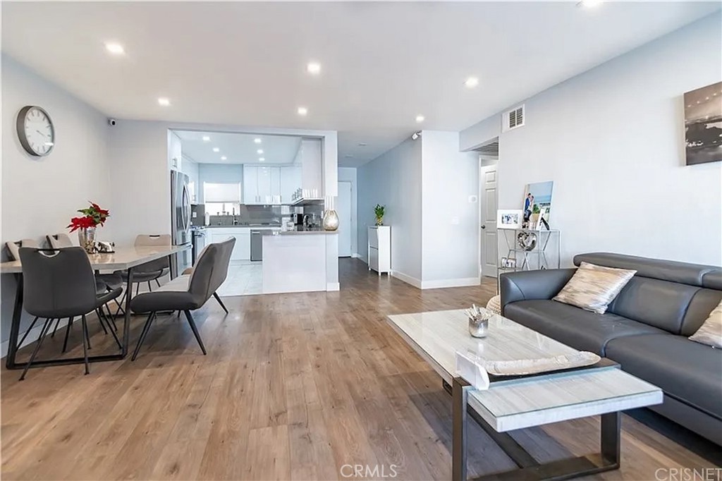 Indulge in modern luxury with this stunning 2-bedroom, 2-bathroom condominium, ideally situated in a prime Glendale community. This extensively remodeled unit offers a seamless blend of comfort and style, highlighted by a contemporary kitchen, pristine flooring, upgraded electrical systems, and beautifully appointed bathrooms. The generous floor plan is complemented by an immense private balcony, providing a serene outdoor oasis and bathing the interior in natural light. Residents have exclusive access to a well-maintained swimming pool and jacuzzi, gated parking spaces with additional storage, and the convenience of an elevator. Enjoy the vibrant Glendale lifestyle with effortless access to premium shopping, dining, and entertainment destinations like Trader Joe's, Ralphs, the Glendale Galleria, and Americana. A remarkably low HOA of $360 further enhances the appeal of this exceptional property.