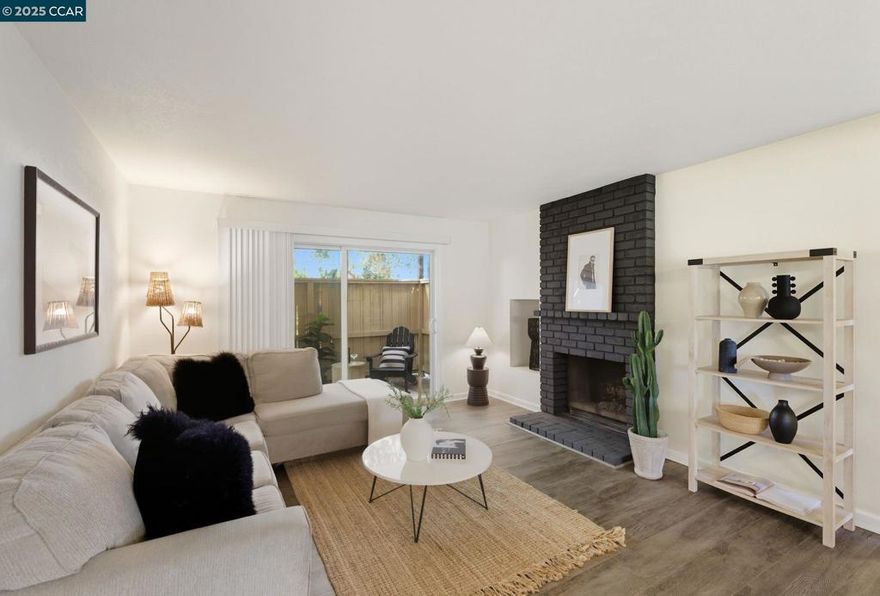 Welcome to 2055 Sierra Road, Unit 71 — a spacious and private end-unit condo in the heart of Concord. This desirable 3-bedroom, 2-bath home offers a smart layout with abundant indoor and outdoor living. The living room opens to an expansive patio, also accessible from the first bedroom, perfect for entertaining or enjoying fresh air. The primary suite is a true retreat, featuring a wall-to-wall closet and its own private patio overlooking the canal and lush greenery. Inside, you’ll find updated finishes, beautiful vinyl plank flooring throughout, and brand-new appliances for a modern feel. The primary bath includes a stall shower, while the second bath has a shower-over-tub combo. Added conveniences include an in-unit laundry room and storage is plentiful with an oversized exterior storage closet, ideal for holiday décor or recreational gear. Two deeded parking spaces—one covered, one uncovered—are included. Community amenities feature a pool, hot tub, and sauna. All in a prime location across from Costco, near restaurants, and minutes to Concord BART. Quiet, private, and move-in ready, this home is a rare find.