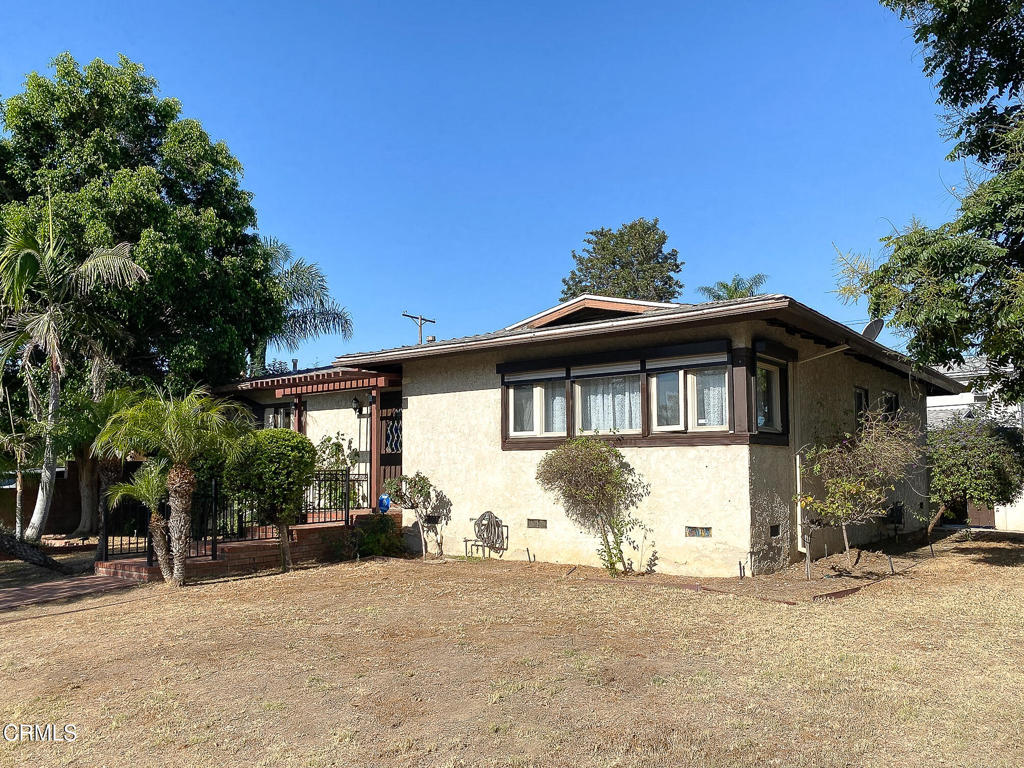 Welcome to a rare opportunity in the heart of North Hills, a charming city nestled within the San Fernando Valley! This 3-bedroom, 2-bathroom diamond in the rough, built in 1953, spans 1,294 sq. ft. on an expansive 8,262 sq. ft. corner lot, offering endless potential to create your dream home. Priced at $797,000, this is the lowest-priced home in a desirable neighborhood where remodeled properties often command $1,000,000 or more!Step inside to discover a spacious kitchen with a cozy breakfast nook and a convenient laundry area. The living and dining area dazzles with floor-to-ceiling windows, showcasing views of the freeform pool in the large, private backyard--perfect for entertaining or relaxing. The primary bedroom is a standout, featuring a striking floor-to-ceiling rock fireplace and a large bay window that floods the space with natural light. The second bedroom also boasts a bay window, adding charm and brightness.The backyard is a blank canvas with access to a detached garage, currently used as a bonus room but ripe for a possible conversion into an ADU--ideal for extended family, in-laws, or rental income. A side patio offers additional space for a play area, garden, or RV parking. Though the home needs a little TLC, its potential is undeniable, with plenty of room in the budget to transform it into a spectacular modern retreat.This property is just minutes from schools, shopping, and the VA hospital. With easy access to the 405 and 118 freeways, you're a short drive from anywhere in the Valley or West L.A.Don't miss this chance to invest in a home with incredible upside in a prime location.