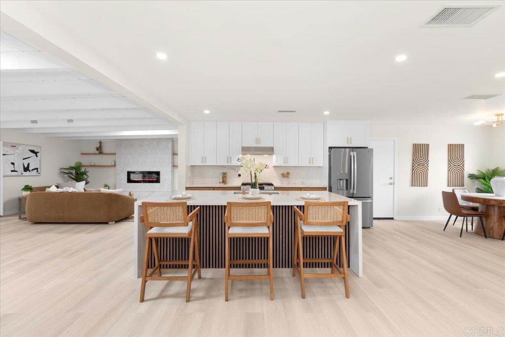 Welcome to this beautifully renovated home in wonderful Clairemont! Thoughtfully updated from top to bottom, this unique 5 bed, 2 bath 1,974 sf home blends modern comfort with timeless charm. Enjoy the benefits of owned solar and an additional 375 sf of versatile living space thanks to a newly converted sunroom —perfect for a home office, playroom, or relaxation area. The interior features brand new GE appliances, luxury vinyl plank flooring, central AC , and freshly updated landscaping, making this property truly move-in ready. Ideally situated with easy access to major freeways, shopping centers, dining, schools, and hiking trails, this centrally located gem offers the best of San Diego living. Don’t miss the opportunity to make this turnkey home yours!